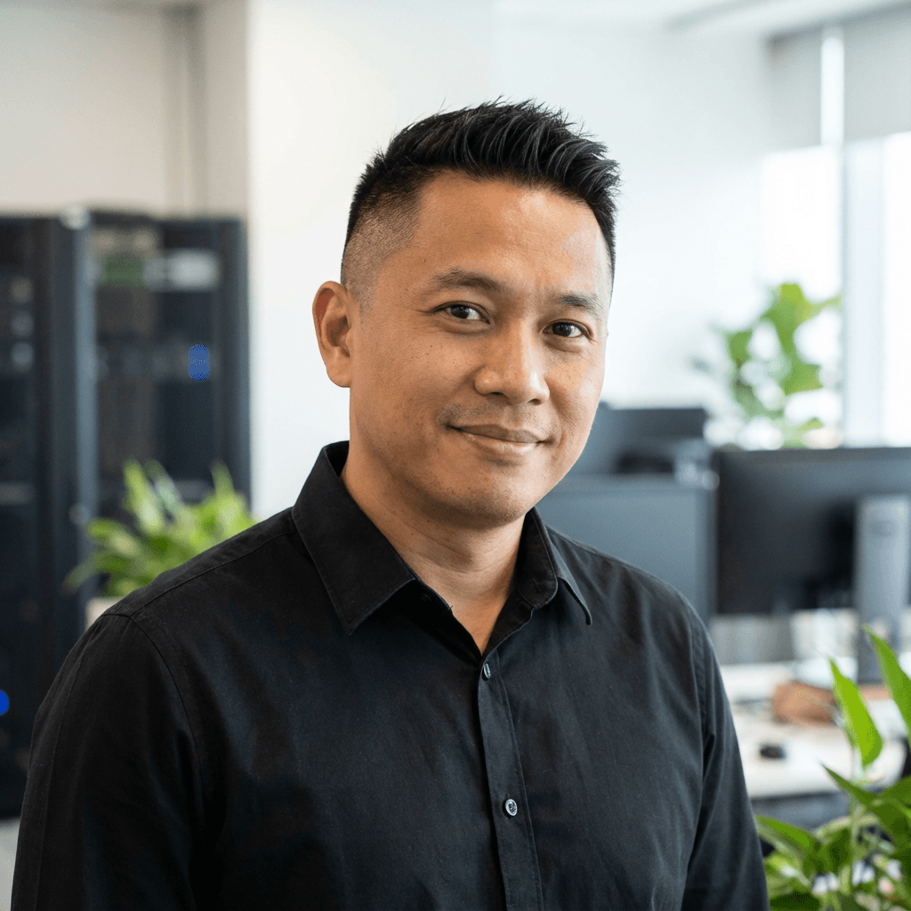 Marcus Chen in professional attire smiling